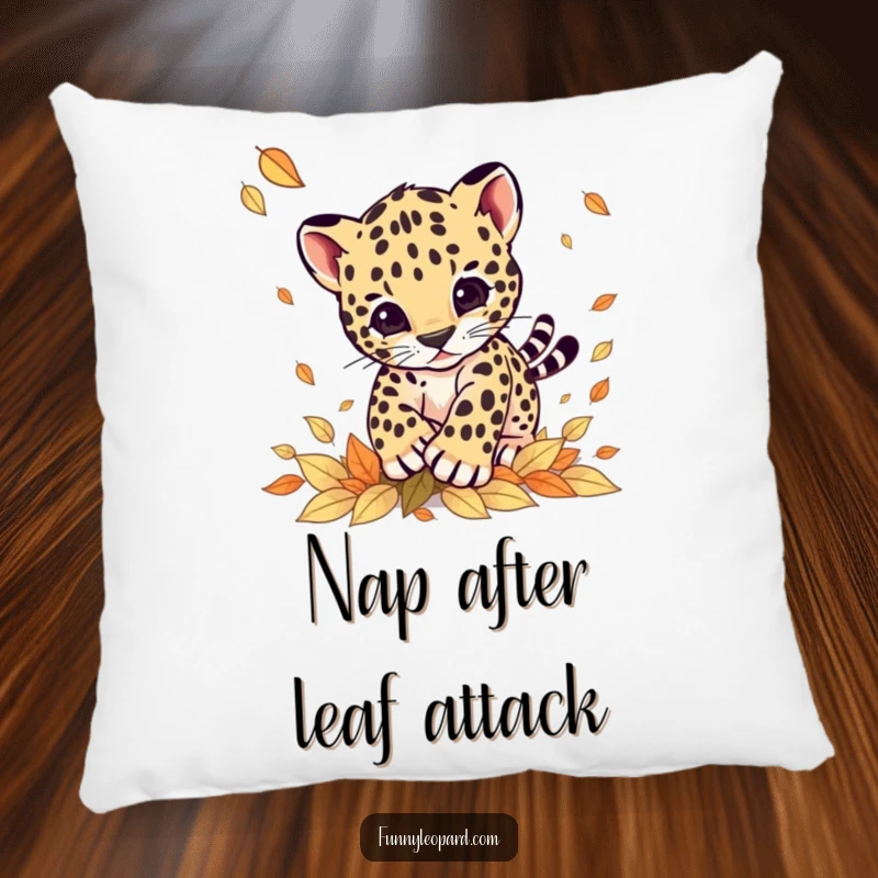 Funny pillow showing a cute leopard cub in mid-air, pouncing playfully on scattered autumn leaves, adding comfort and humor.