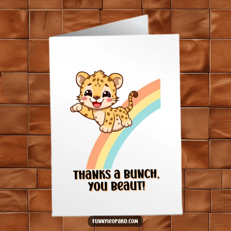 Funny Free Printable Thank You Card: Cheerful leopard slides down a vibrant rainbow, expressing gratitude with a big, happy grin.