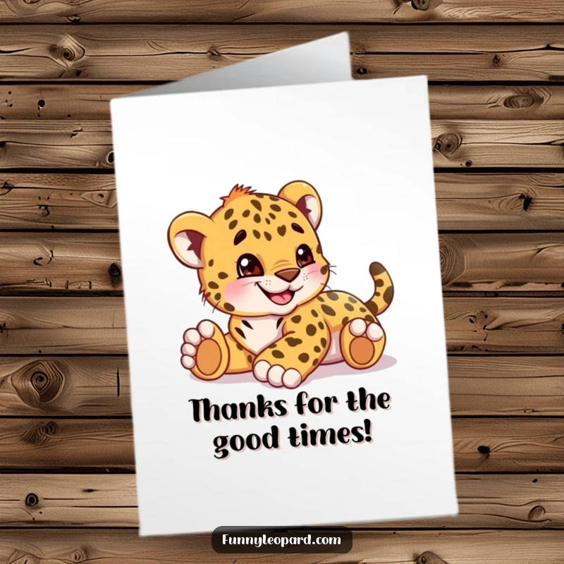 Funny Free Printable Thank You Card: A playful leopard cub cub rolls on its back with a grin, saying thanks.