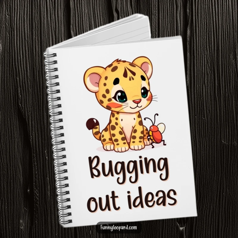Funny notebook adorned with a curious leopard cub cub tilting its head at a wiggling bug, perfect for notes.